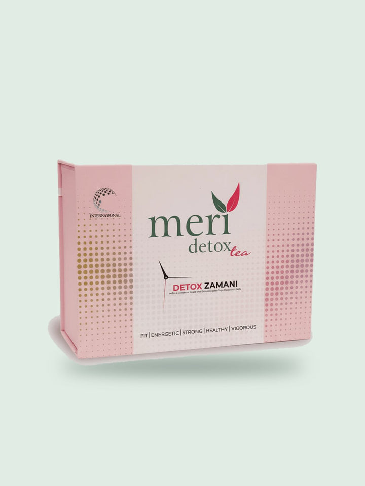 Pink Meri Detox Tea box with 60 tea bags, on a soft sage background